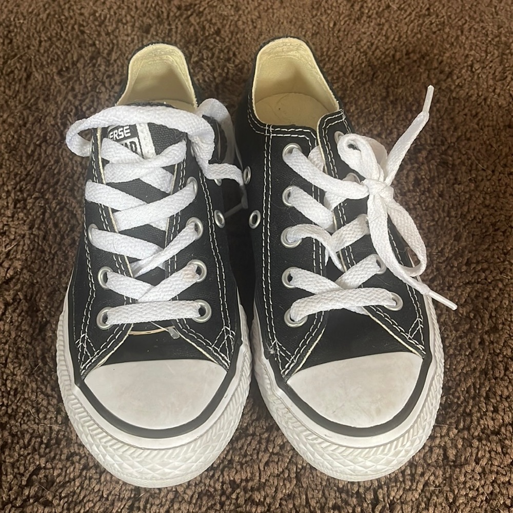 Black and white kids converse worn two times